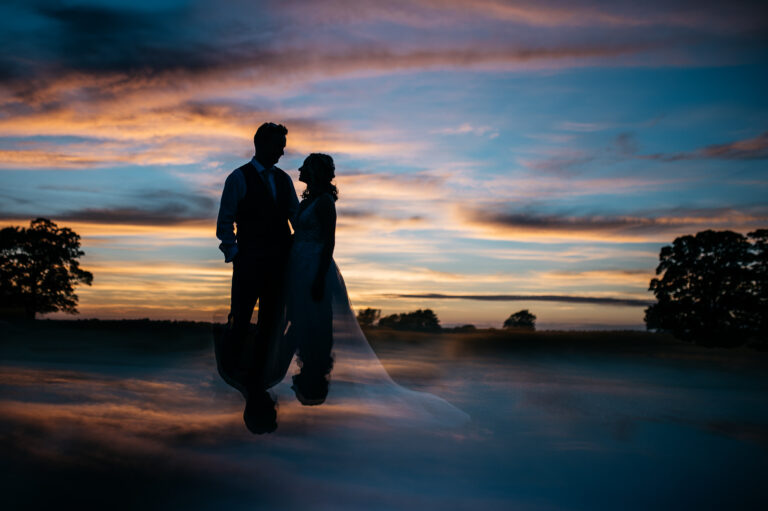 silhouette of Bride and Groom during Sunset at Cattows Farm